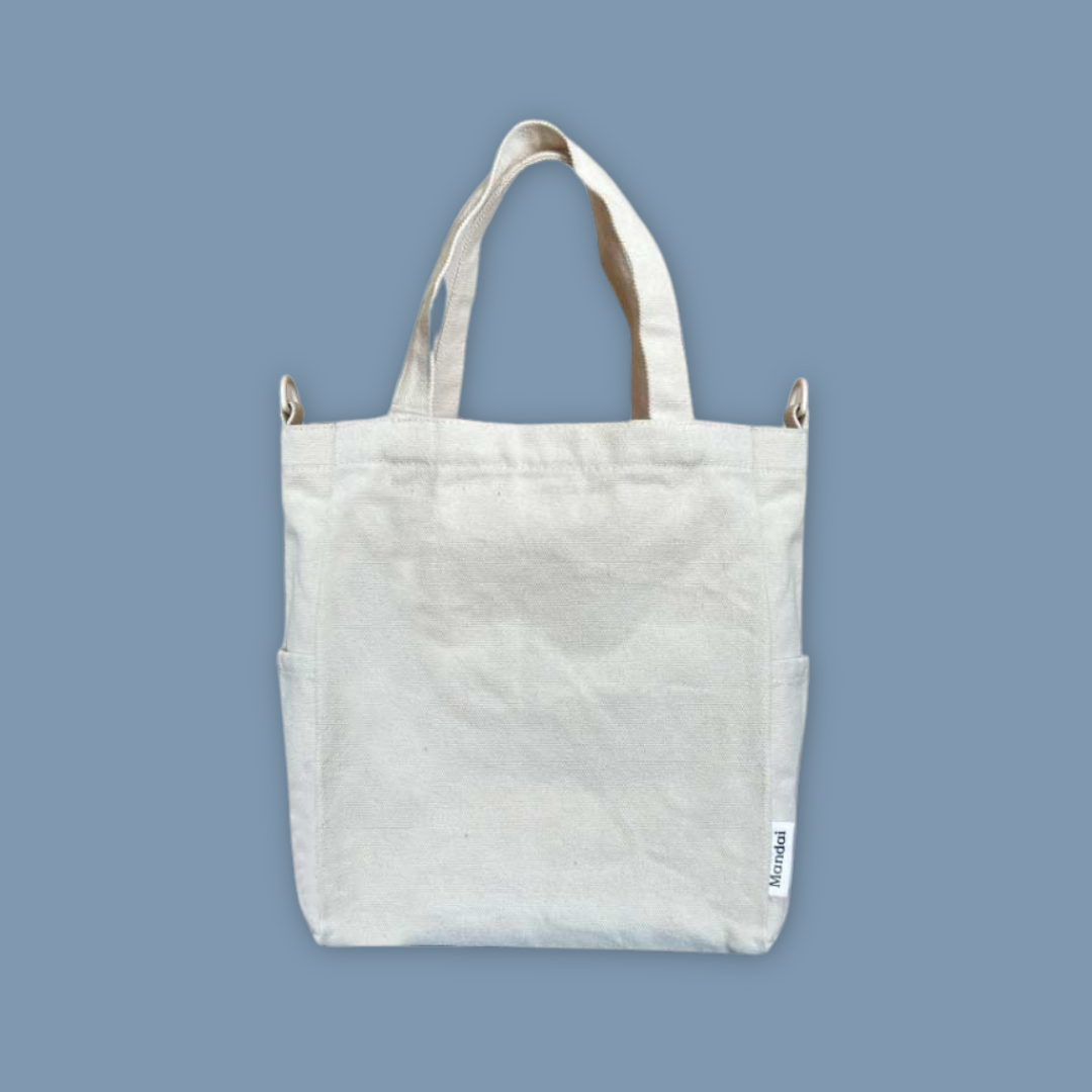 White tote bag with a visible brand logo Mandai Wildlife Reserve