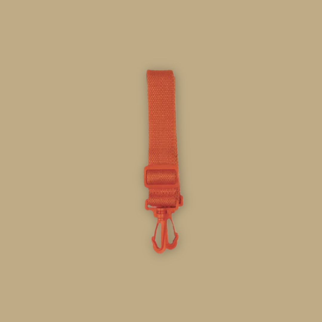 Orange strap with a clip on a beige background Mandai Wildlife Reserve